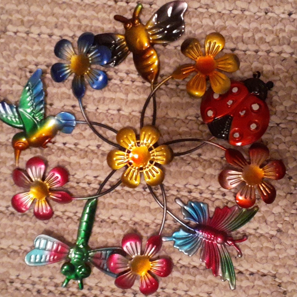 beautiful multi critter wind spinner. ( stunning ) Brand New.